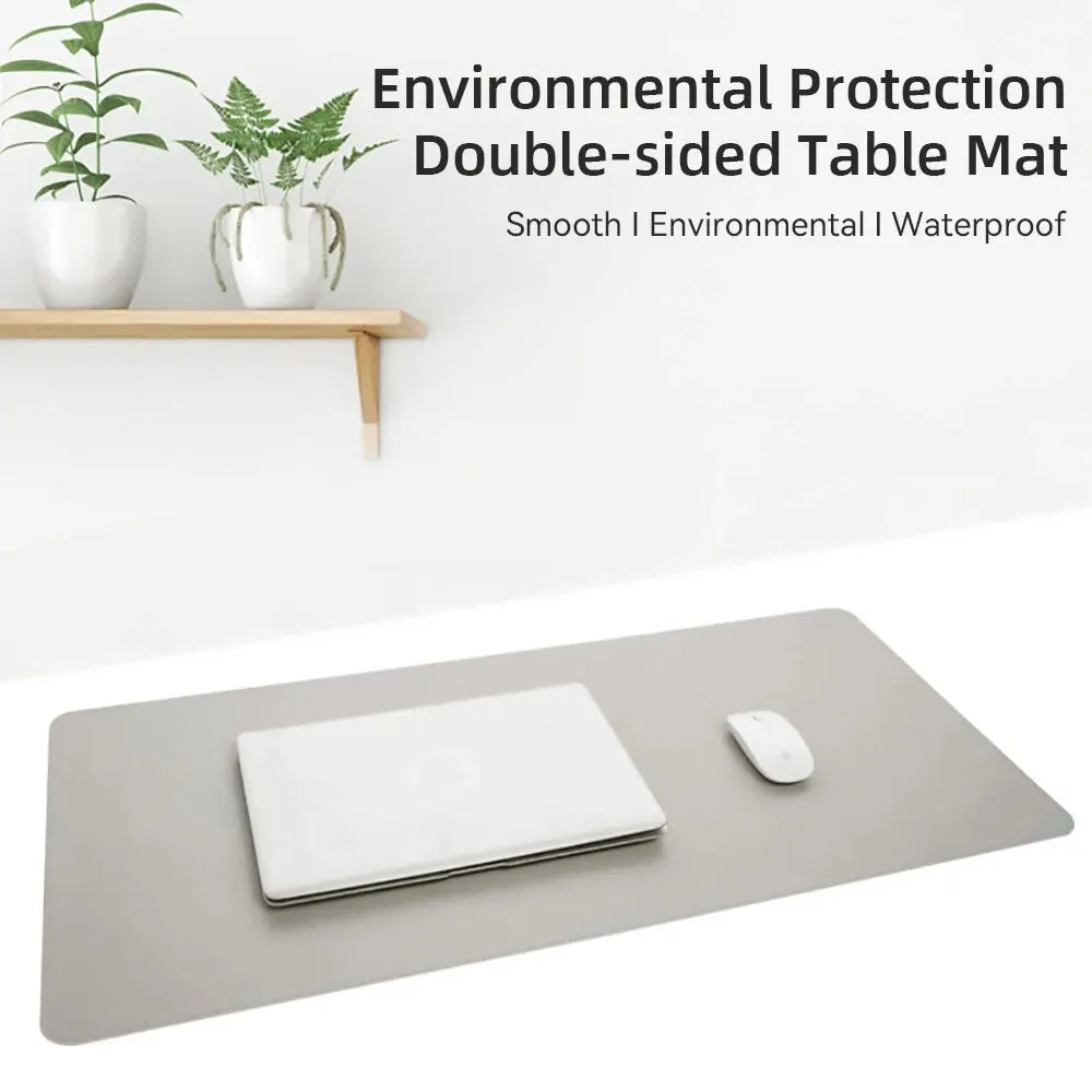 Large black PU leather office desk protector mat with waterproof surface, suitable for mouse and keyboard on a desktop.