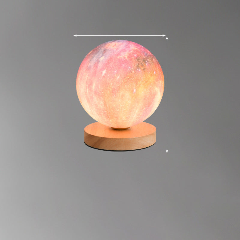 Eprolo 3D Moon Lamp on bedside table, creative moon-shaped desk lamp with charging feature and soft glow for bedroom decor