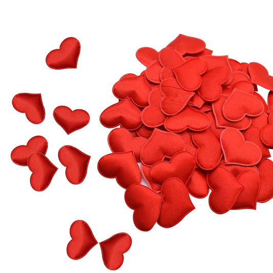 Set of 50 romantic satin fabric heart-shaped wedding confetti petals in white, ideal for table decor and Valentine decorations.