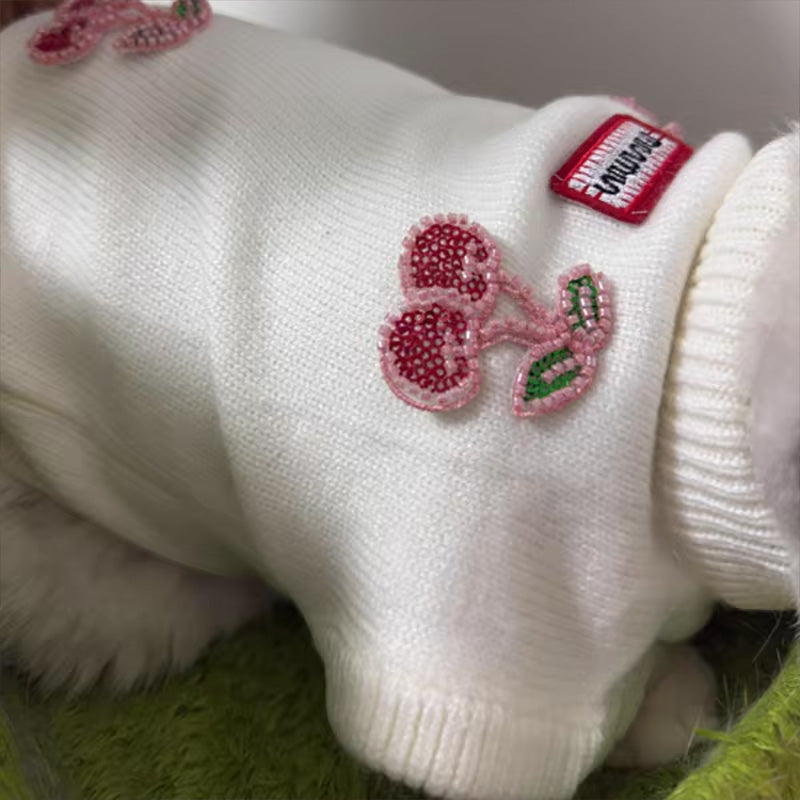 Cute Maltese winter sweater by eprolo featuring a fruit-print knit design for warmth and style.