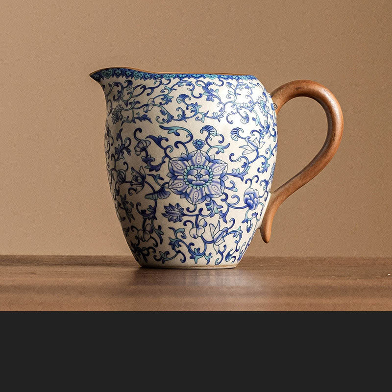 Blue and white ceramic Kung Fu tea set with lotus design, including teapot, fair cup, lid, and bowl by eprolo