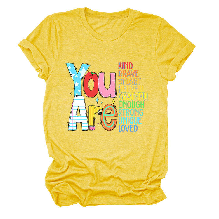 Women’s funny summer T-shirt by eprolo with short sleeves, featuring playful text about being kind, brave, and smart.