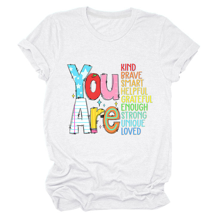 Women’s funny summer T-shirt by eprolo featuring motivational words "kind, brave, smart" with short sleeves.