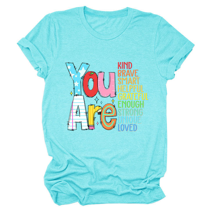 Women’s funny summer T-shirt by eprolo featuring the words "kind brave smart" on short sleeves, perfect for casual wear.