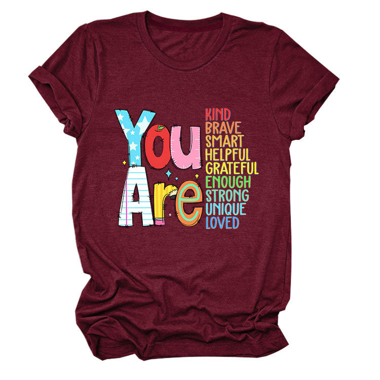 Women's funny summer T-shirt by eprolo with short sleeves, featuring playful text about being kind, brave, and smart.