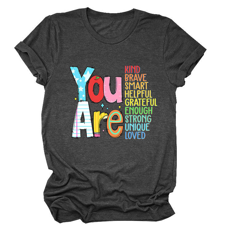Women’s funny summer T-shirt by eprolo with short sleeves, featuring playful text about kindness, bravery, and intelligence.