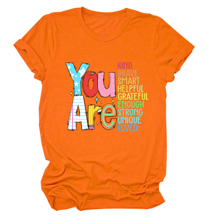Women’s funny summer T-shirt by eprolo featuring bold "you are kind, brave, smart" text in short sleeves.