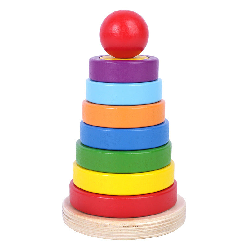 Colorful wooden geometric circular stacking blocks by eprolo, arranged in a rainbow tower for children's early education and play.