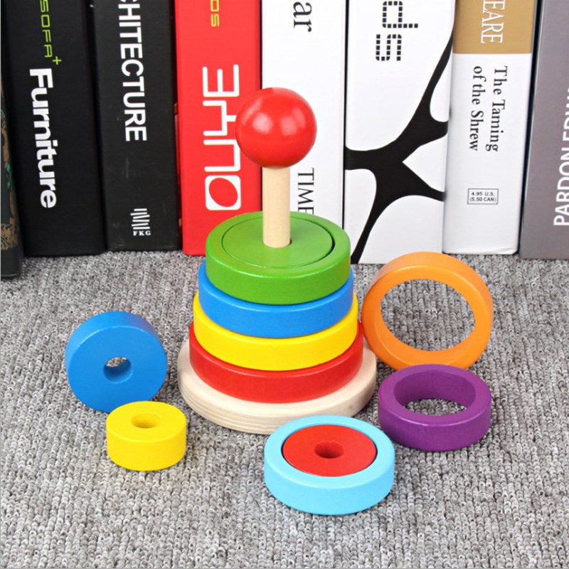 Colorful wooden geometric circular stacking blocks for children, part of eprolo's rainbow tower puzzle and early education toy set.