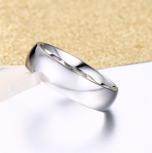 Vnox 6mm classic wedding band for men and women, smooth silver-colored stainless steel ring, shiny finish.