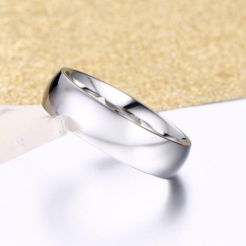 Vnox 6mm classic wedding ring for men and women in polished metal, featuring a simple, elegant band design.