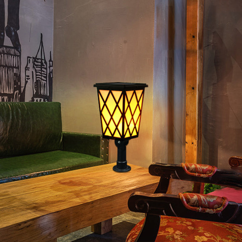 Eprolo solar LED flame light outdoor villa garden wall lamp illuminating a garden wall with warm LED flame effect.