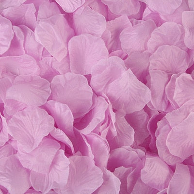 Artificial pink rose petals for wedding party decoration, provided by eprolo, used for marriage and Valentine's Day celebrations.
