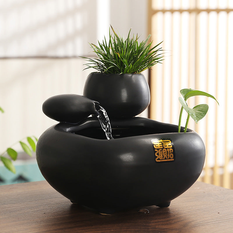 Ceramic mini desktop water fountain ornament with flowing water, designed for living room decor by eprolo