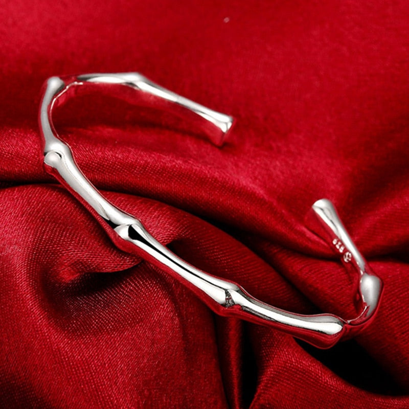 Elegant silver romantic bracelet and bangles for women featuring hot bamboo joint design, open cuff style, by eprolo.