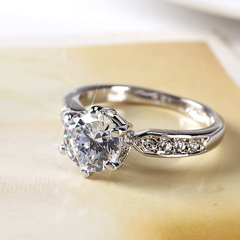 Elegant women's Korean wedding ring by eprolo featuring a luxurious, living mouth design in polished metal.