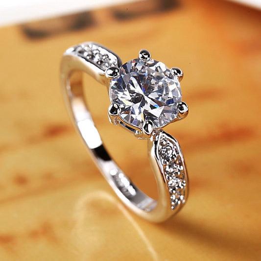 Elegant women's Korean-style wedding ring by eprolo featuring a luxurious living mouth design in polished metal.