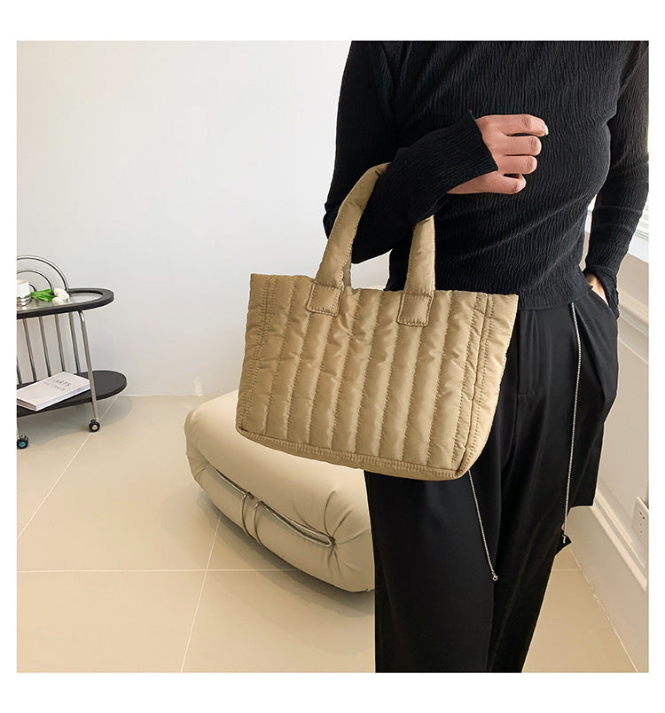 Large capacity eprolo cotton tote bag with simple design, embroidery details, handheld and shoulder strap for fashion and casual use.