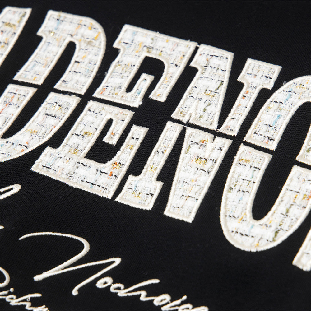 Eprolo embroidered hooded sweatshirt with colorful alphabet patches, front view showing the casual, comfortable design.