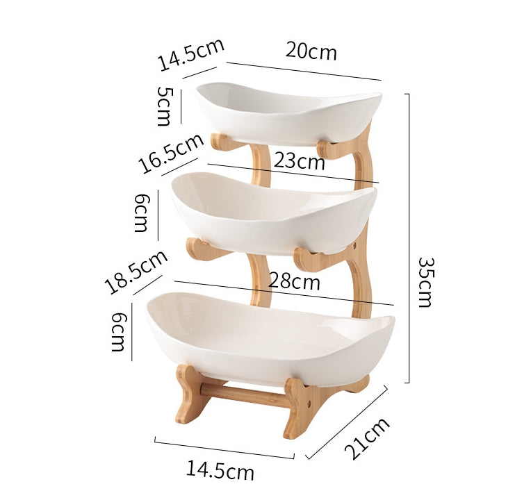 Multi-layer fruit tray by eprolo with compartments for tea snacks, ideal for living room coffee table or front desk display.