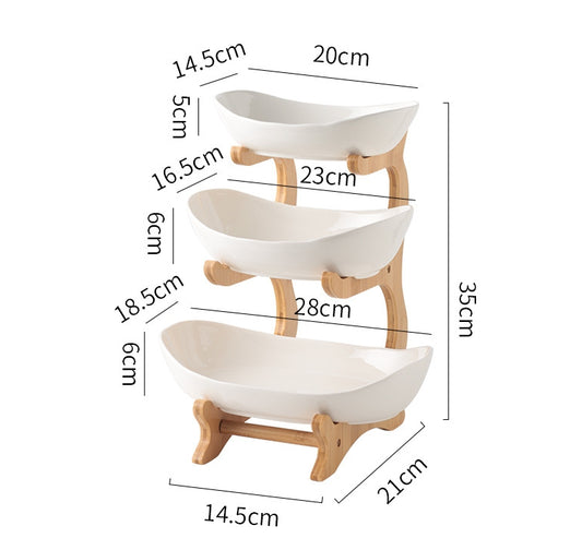 Multi-layer fruit tray by eprolo with compartments for tea snacks, ideal for living room coffee table or front desk display.
