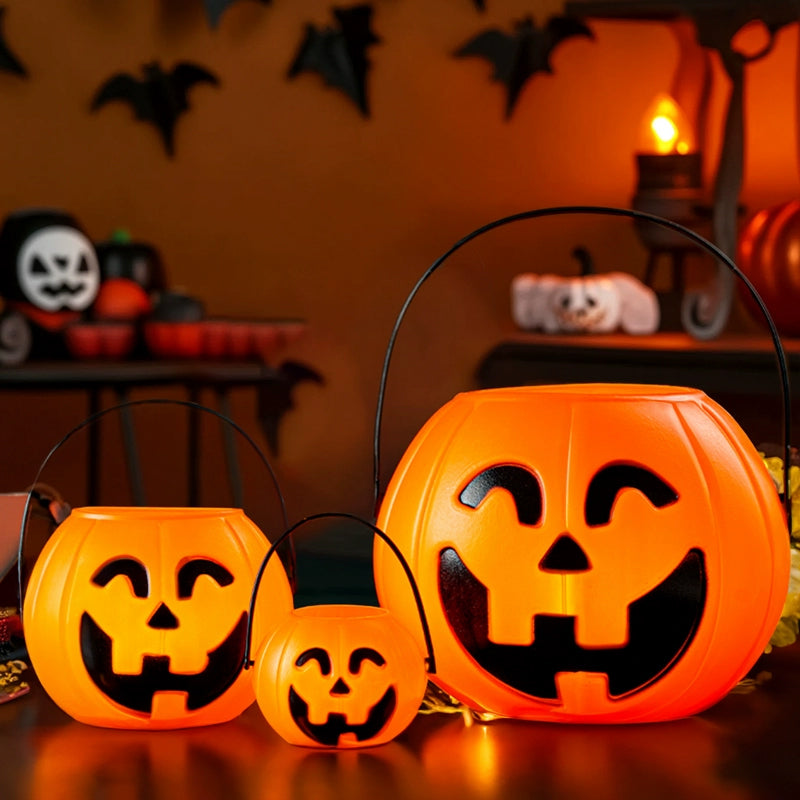 Three plastic Halloween pumpkin buckets by eprolo, 7-inch size, for kids' trick-or-treating and festive home decor.