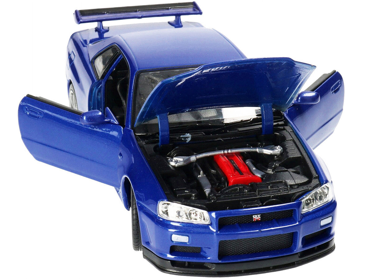 Nissan Skyline GT-R (R34) RHD (Right Hand Drive) Blue Metallic "NEX Models" 1/24 Diecast Model Car by Welly-1